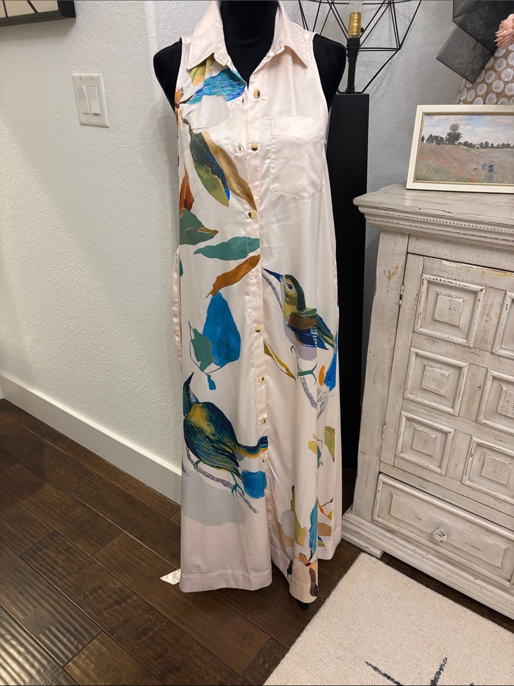 Maeve Sleeveless Shirt Dress Cream, Blue & Green print by artist Raven Roxanna